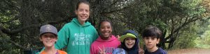 Teen youth leader with campers at Tilden Outdoor Camp in Berkeley