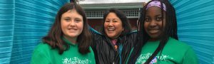 Site director Freesia with two tween youth leaders at February Camp near downtown Berkeley