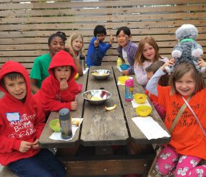 Campers enjoy an organic snack at School Break Camp in Berkeley
