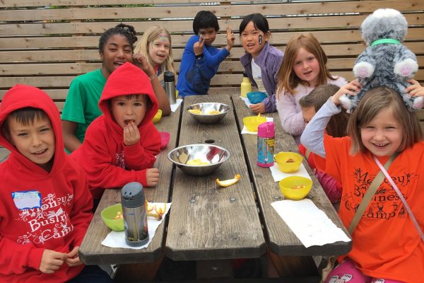 Campers enjoy an organic snack at School Break Camp in Berkeley