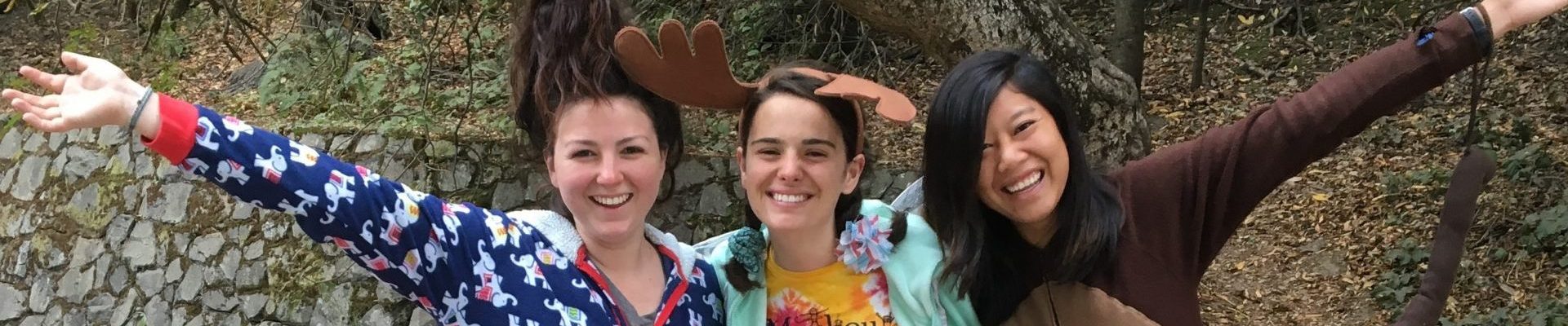 Smiling counselors dress in pajamas for Wacky Wednesday at Tilden Outdoor Camp in Berkeley